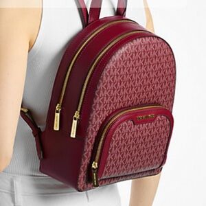 MICHAEL KORS Jaycee Medium Signature Logo Backpack
Cherry 
NWT